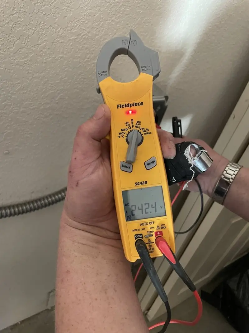 Voltage testing with clamp meter during Aluminum Wiring Replacement in West Des Moines